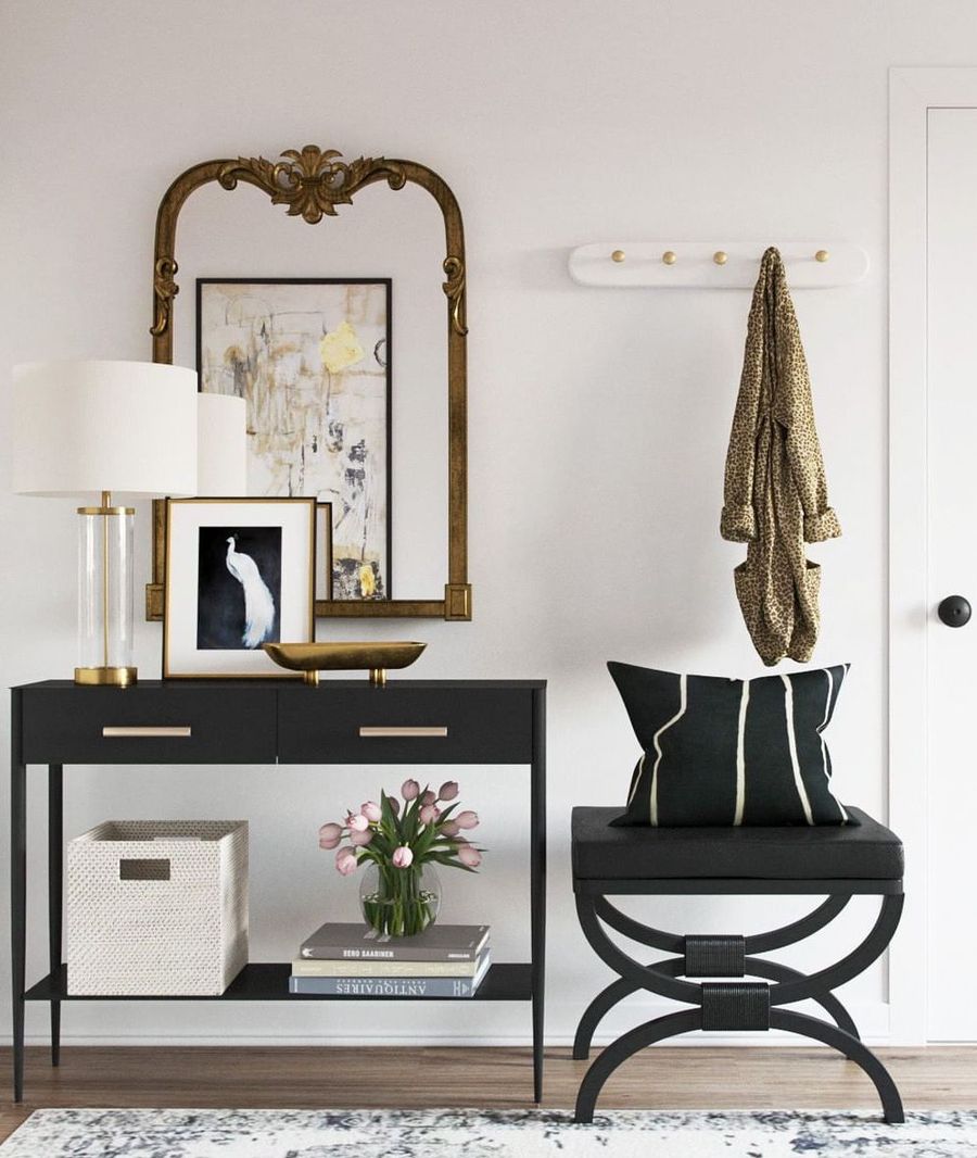 Gold Vintage Mirror in Parisian Entryway Design with Black and Gold via @thehavenly @daniclarkeinteriors