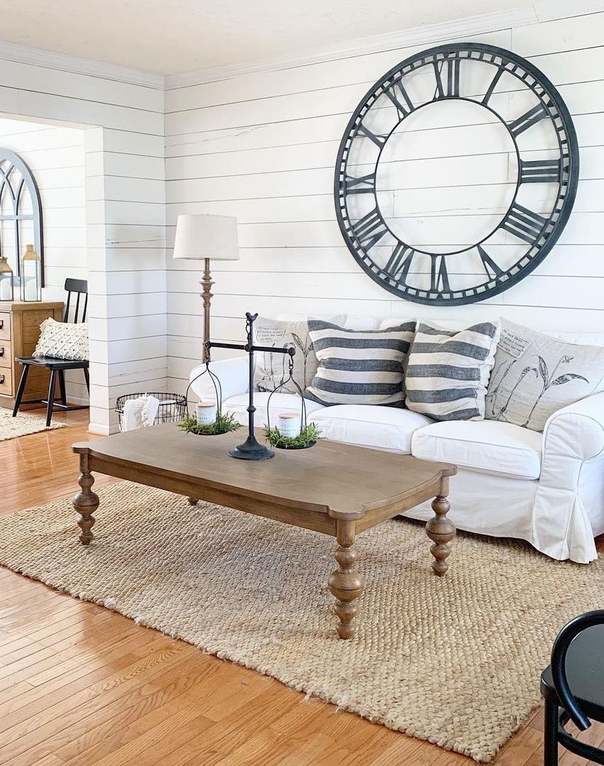 Jute Rug on Hardwood Floors in a modern Farmhouse Living Room via @themodestfarmhouse