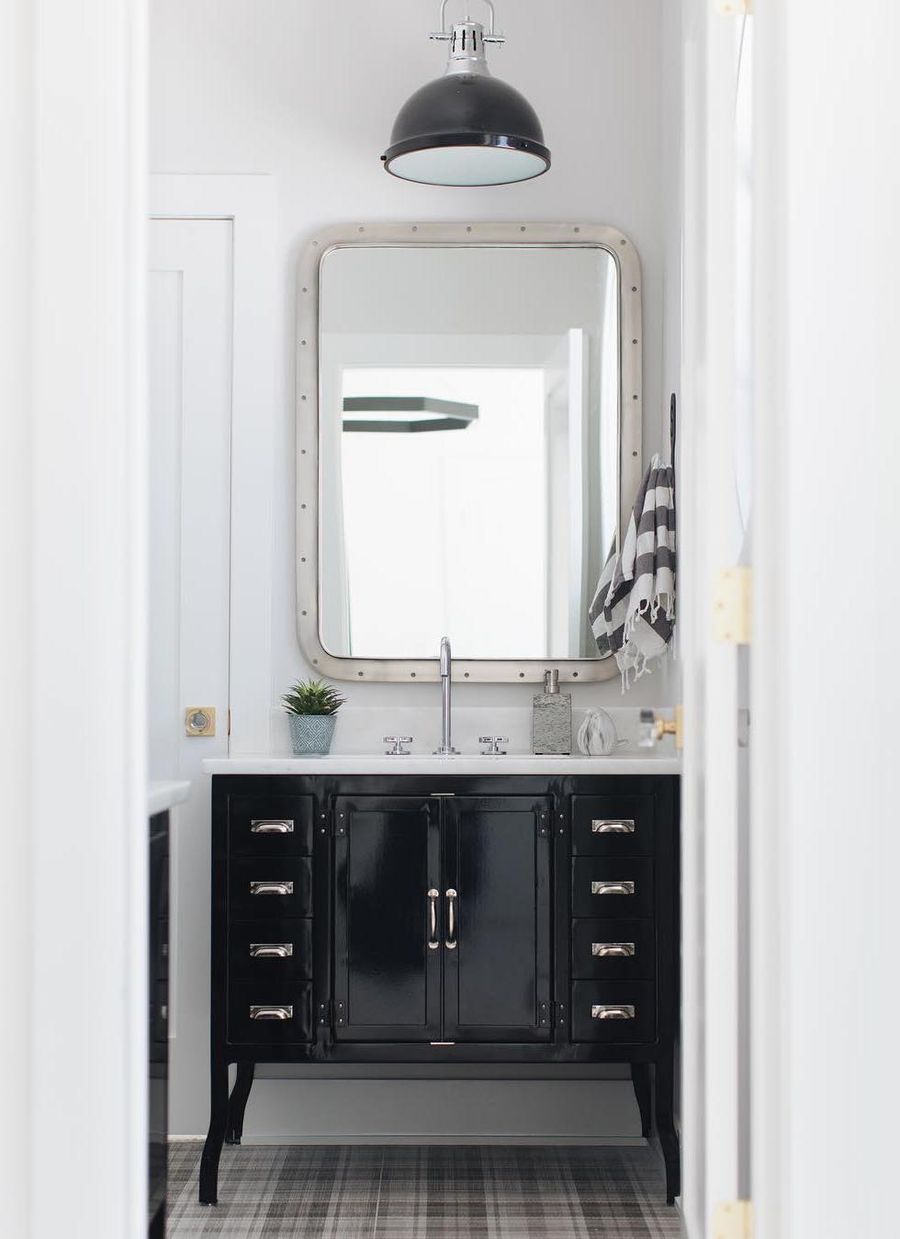 Metal Frame Mirror in Industrial Bathroom via @mhousedevelopment