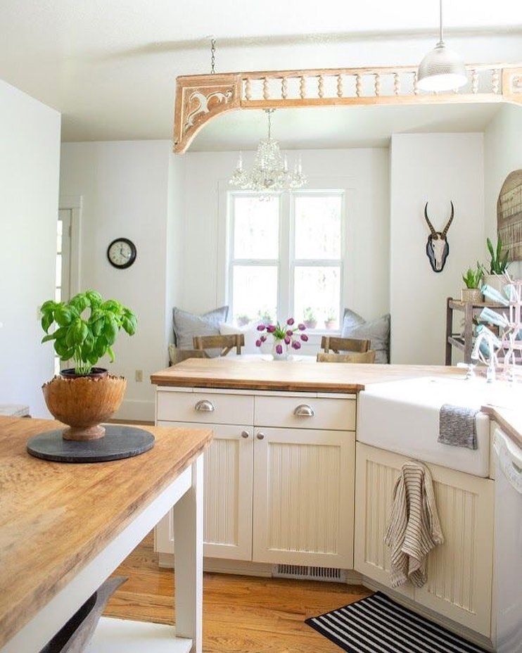 Natural Wood Countertops in Country Kitchen via @fadedcharmliving