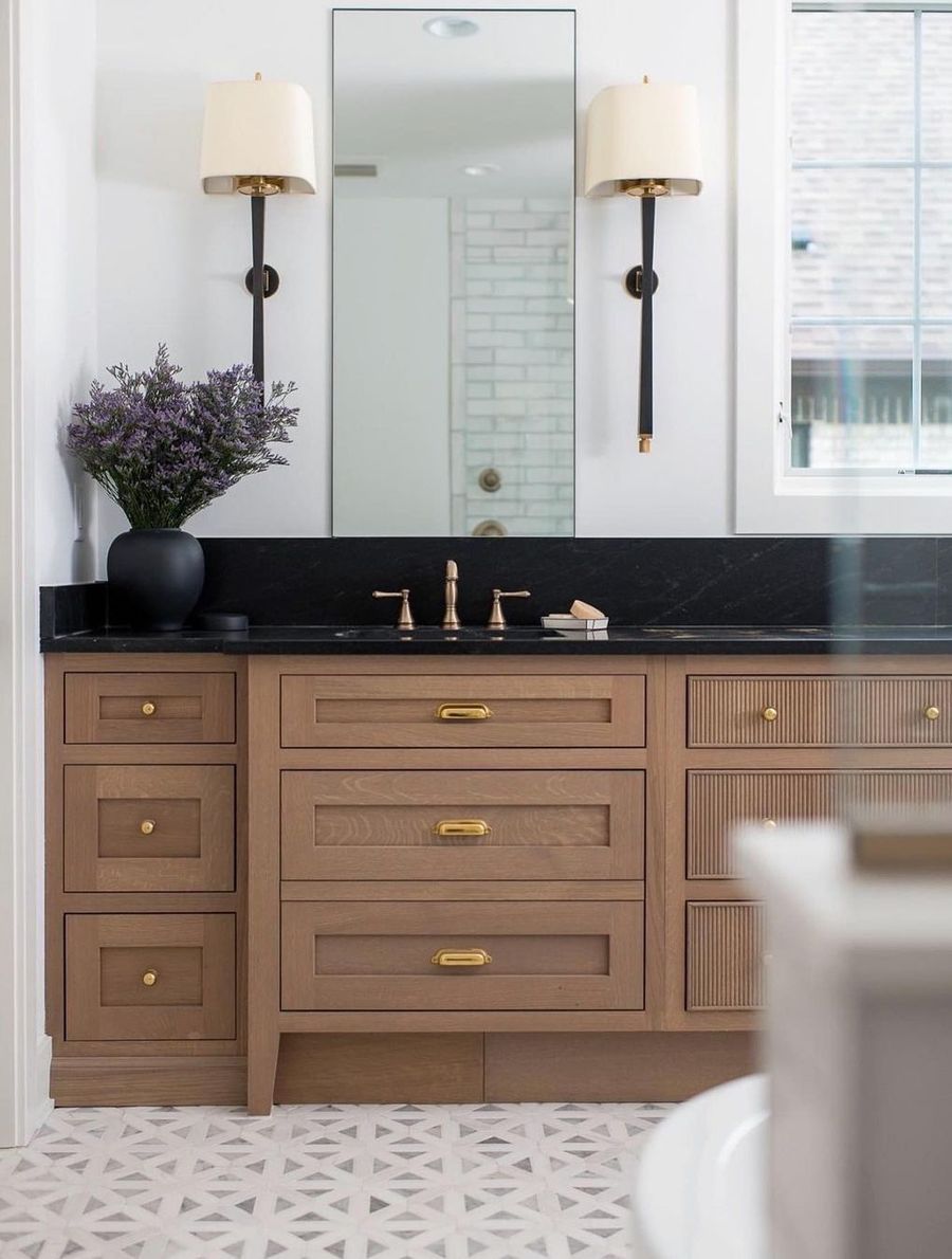 Neutral Bathroom with Black Marble Countertop via @whittneyparkinson