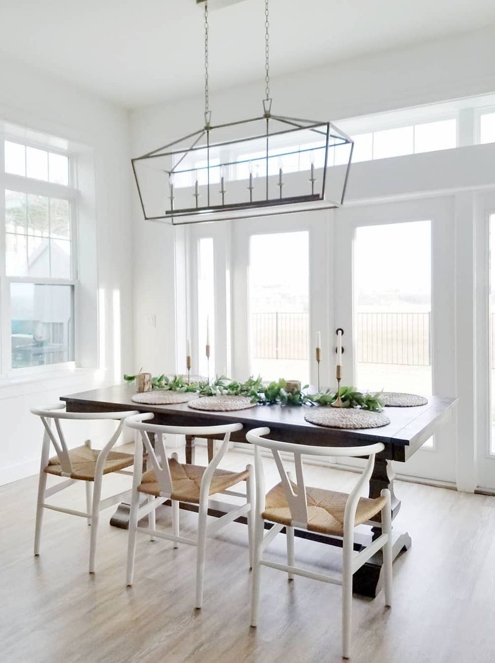 Neutral Dining Room with Wishbone Dining Chairs via @carcabaroad