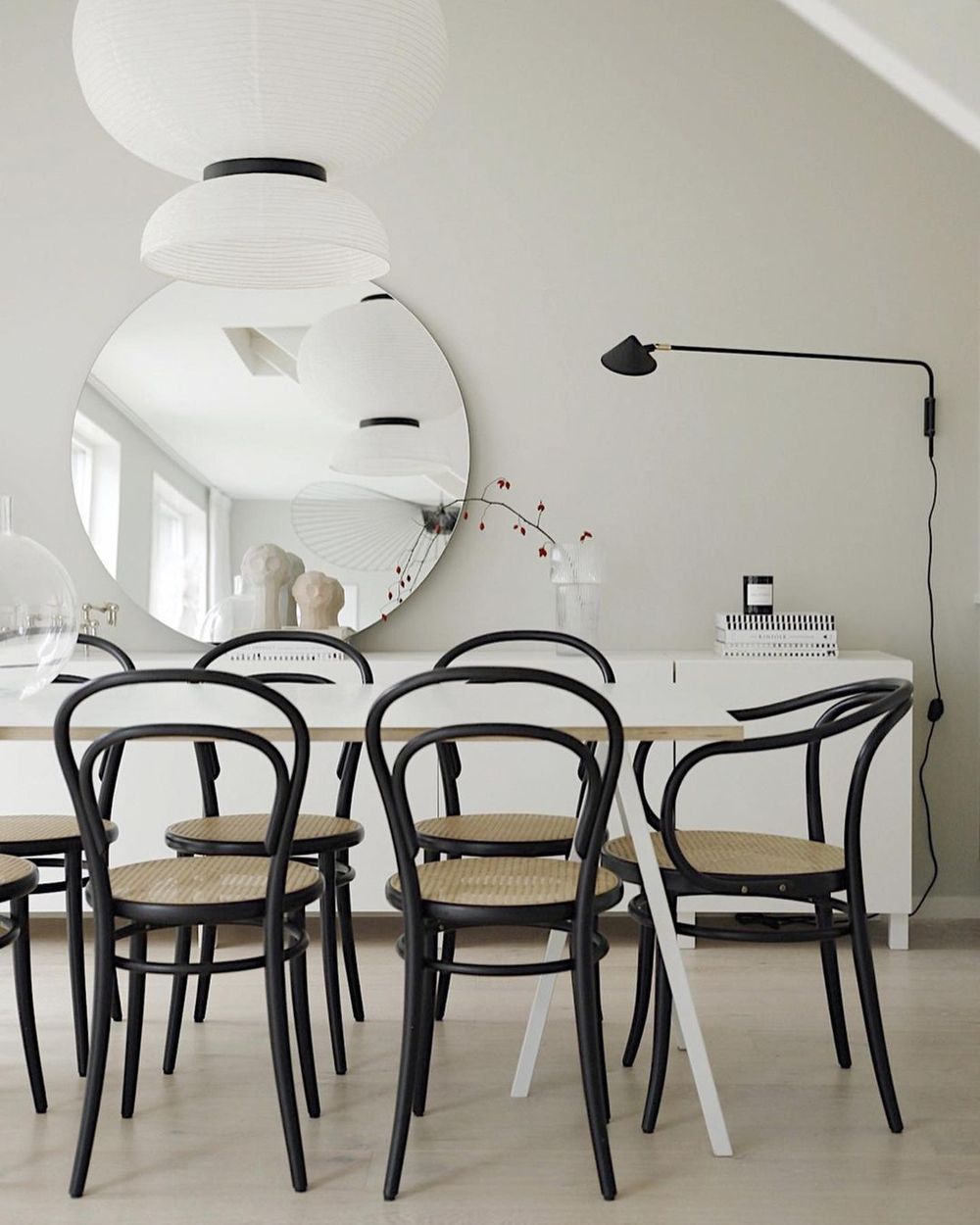 Neutral Dining Room with Black Bentwood Dining Chairs via @emmamelins