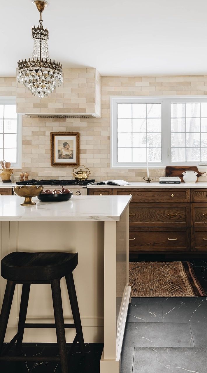 Neutral Kitchen with chandeliers blancmarineliving