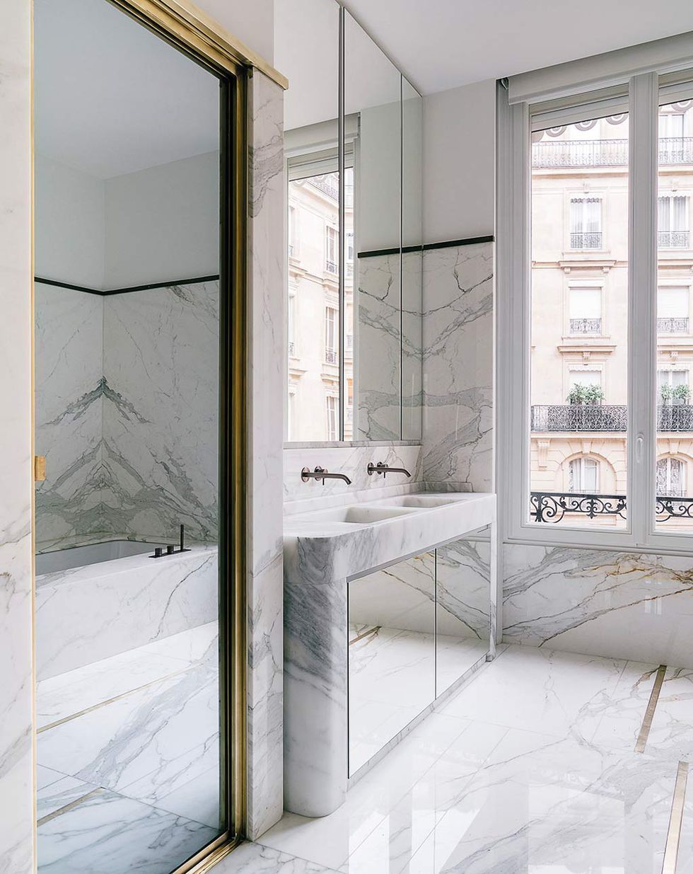 Parisian bathroom decor in White Marble via Claude Missir