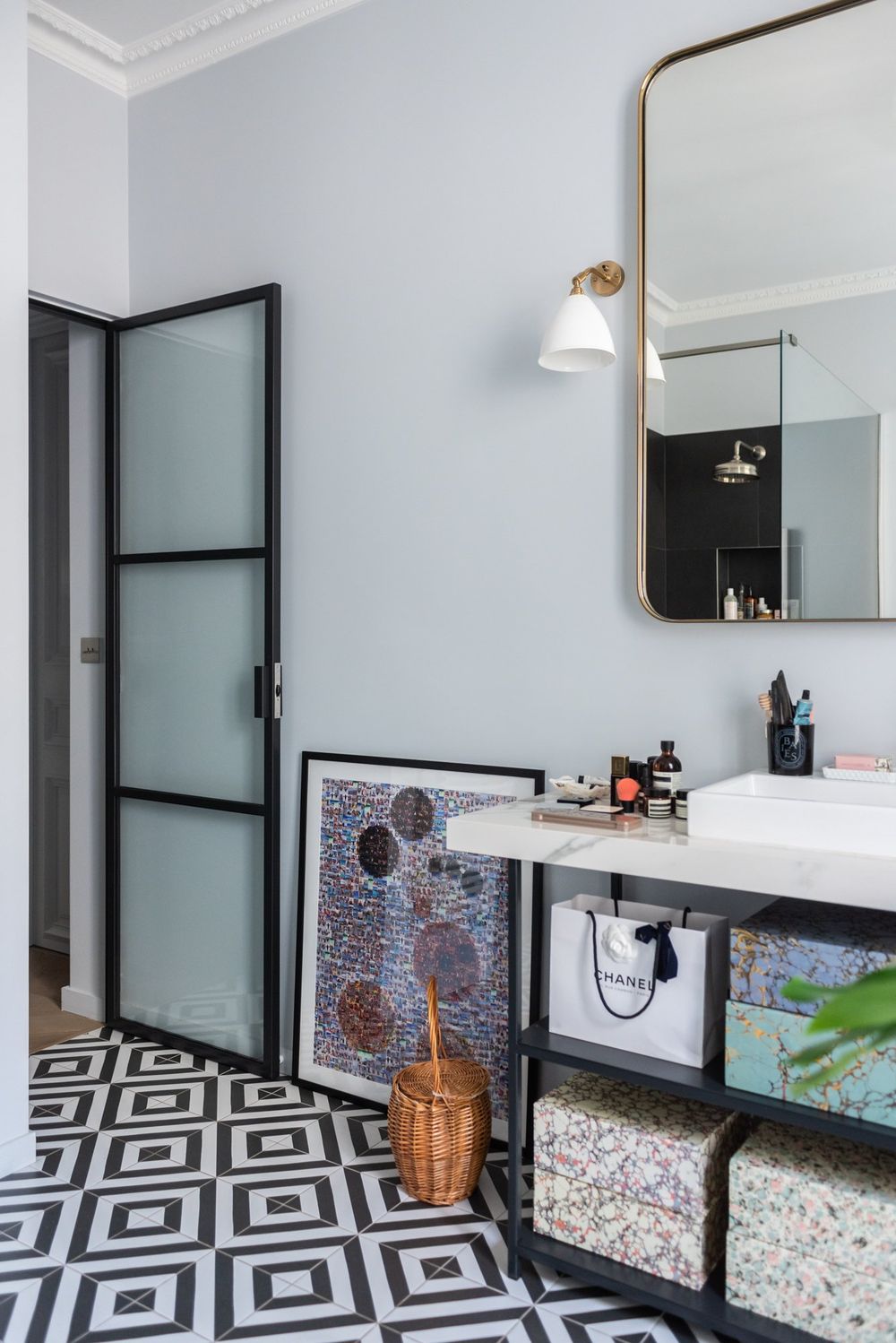 Parisian bathroom with Black and White Floor Tiles via TheSocialiteFamily Florence Elkouby