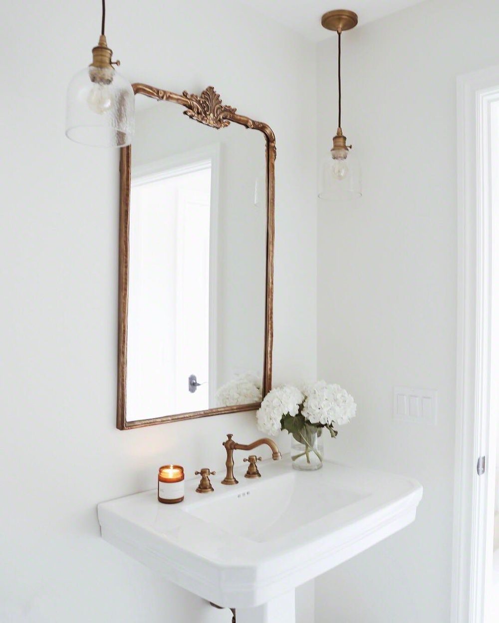 Parisian bathroom design with Brass Lighting Fixtures and Brass Faucet via @lindsaymarcella