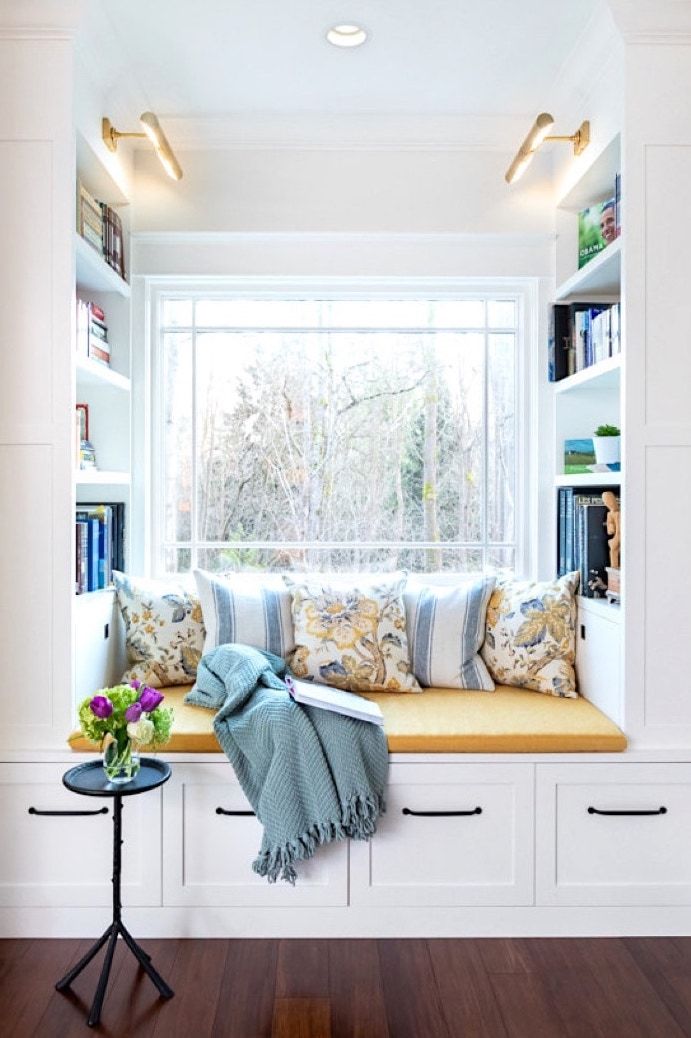 Reading Nook with Yellow Cushion and Lower Storage via Raina Henderson Interior