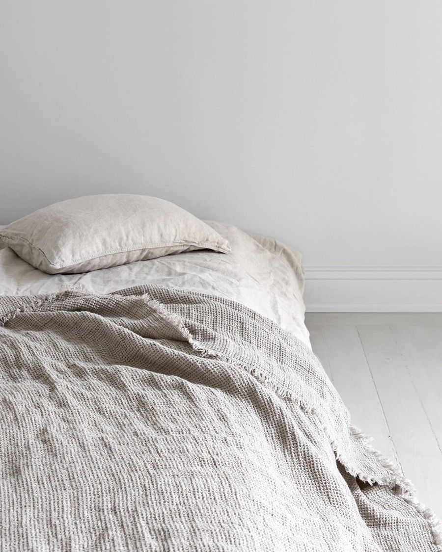 Scandinavian Bedroom with Linen Sheets via Sara Medina Lind