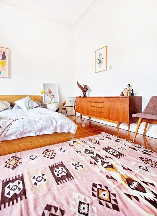 Sideboard in Mid-Century Modern Bedroom with Pink Rug