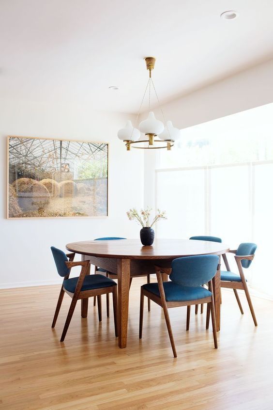 Simple Mid-Century Modern Dining Room with Teal Dining Chairs