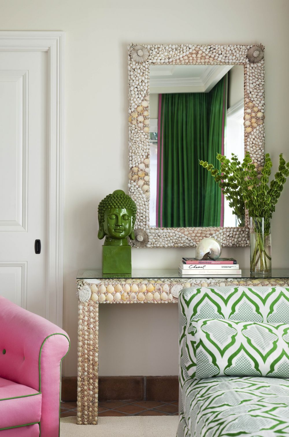 Tropical Living Room with Seashell Mirror and Console Table via Anne Hepfer