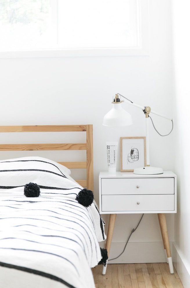 White mid-century nightstand in a Scandinavian Bedroom via Farah Prochaska