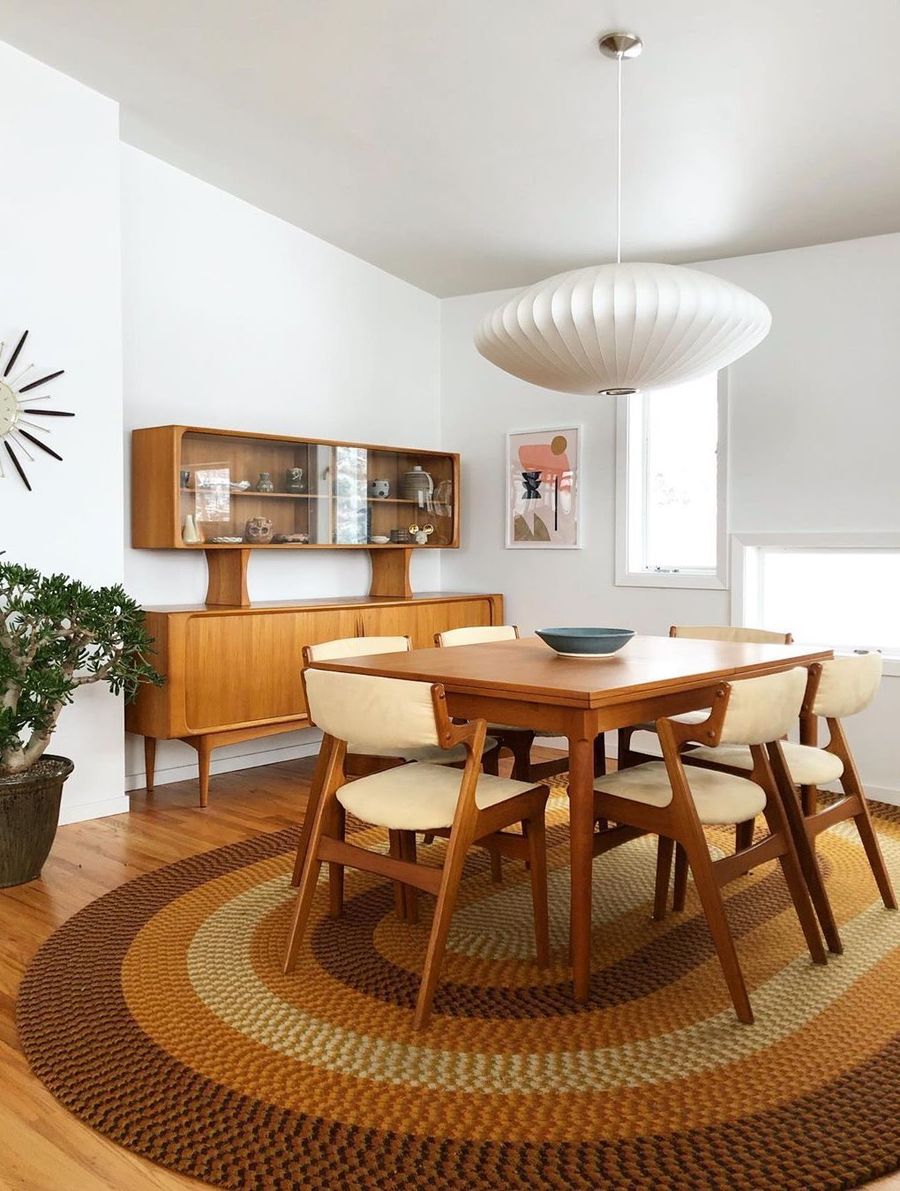 Wood Buffet in Mid-Century Modern Dining Room via @postandbeamliving