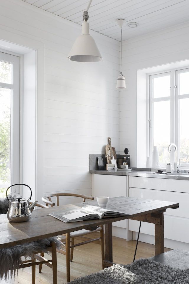 Wood Table Kitchen Island in Scandinavian Kitchen via Sara Medina Lind