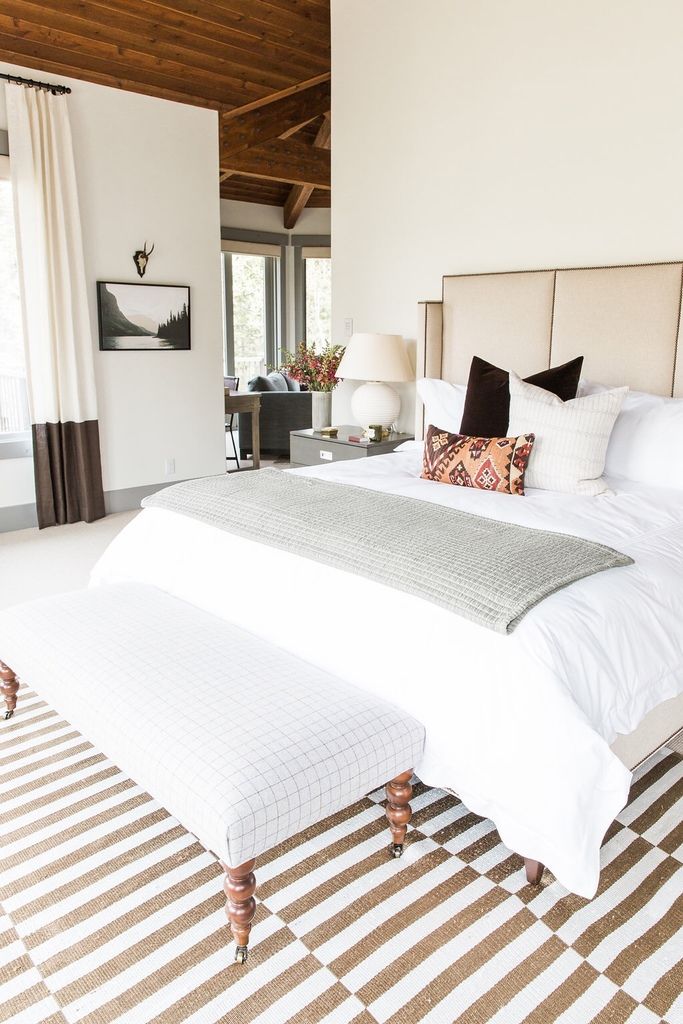 Beige and White Striped Rug Neutral Bedroom via Studio McGee