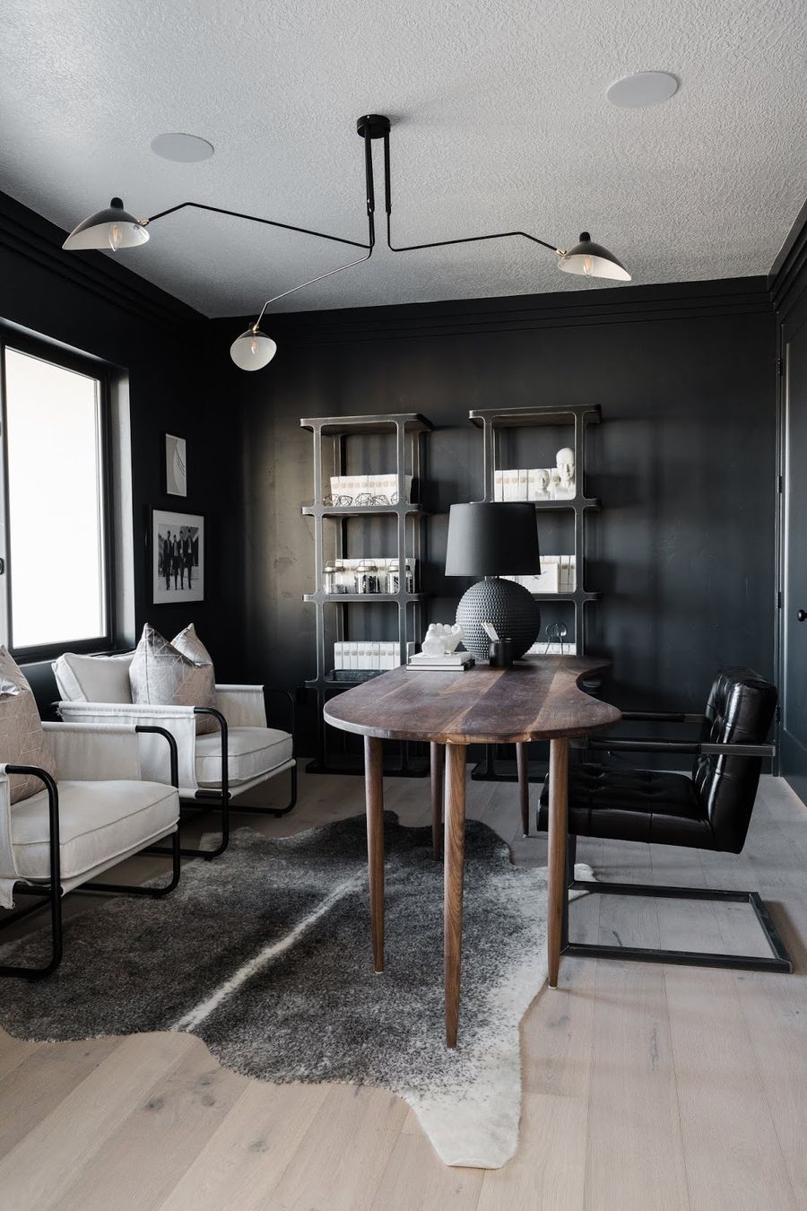 Black Leather Office Chair in Industrial Home Office via theredclosetdiary