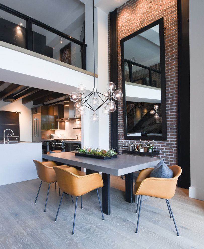 Black Metal Bar Cart in Industrial Dining Room via Denton House Design Studio