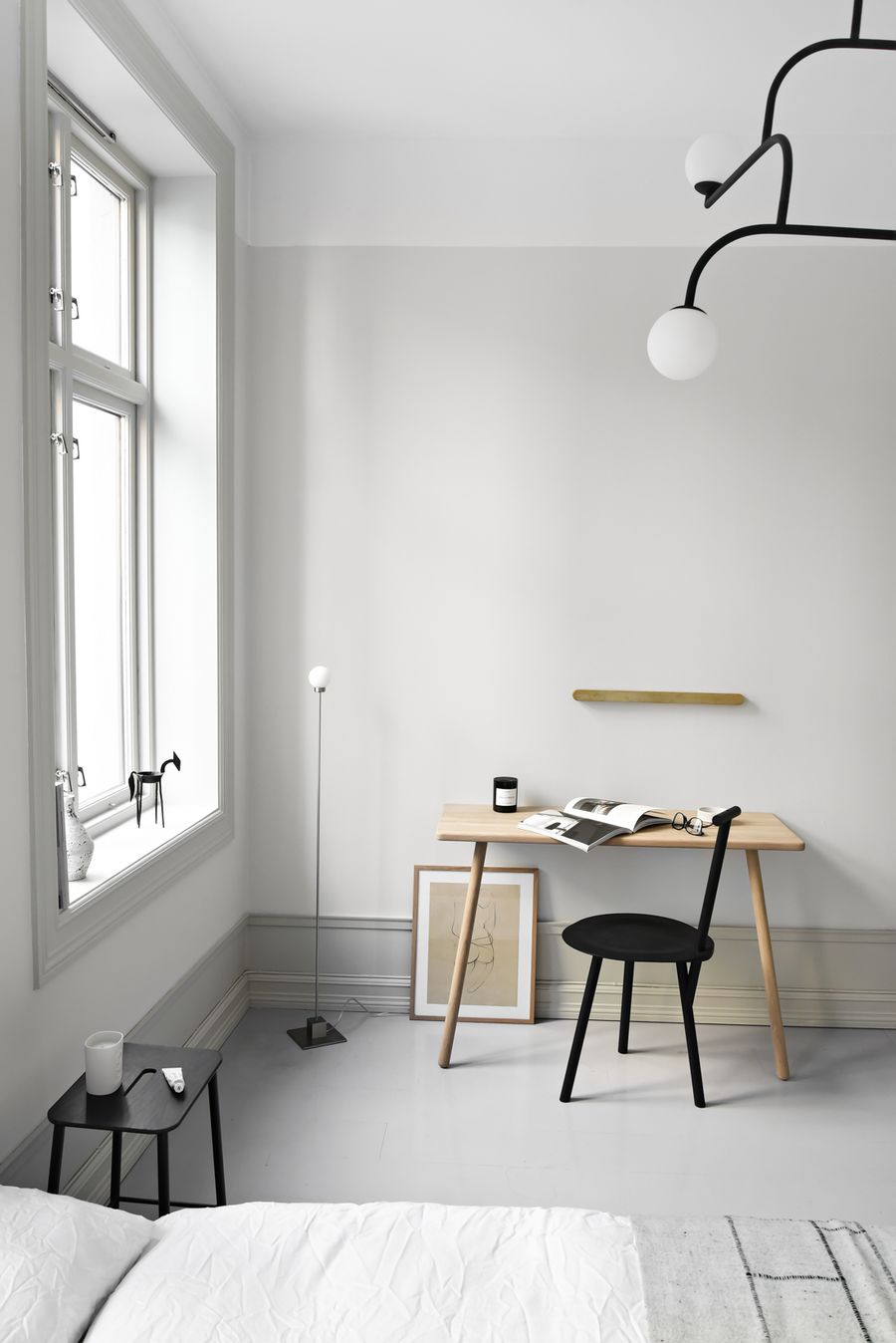 Black Stool in Scandinavian Home Office via Katerina Dima
