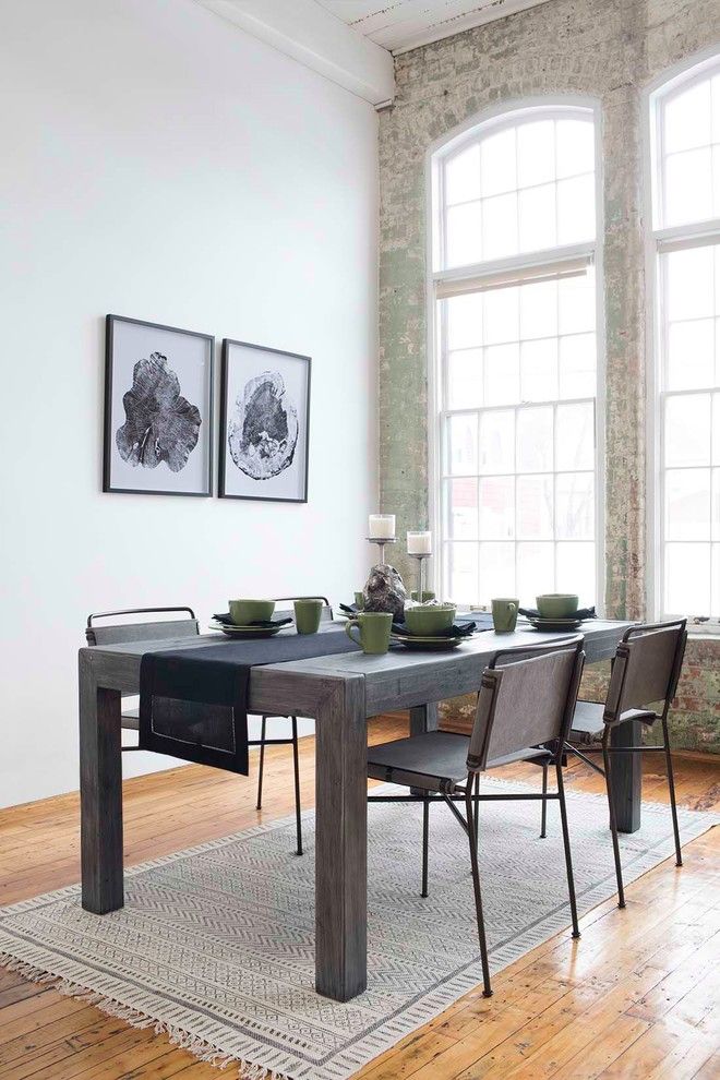 Black and White Art in Gray Industrial Dining Room Design by Houzz