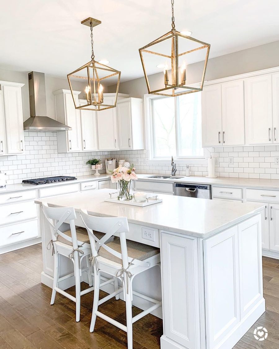 Brass cage pendant lights in Glam Kitchen design ideas via @kathrynpackard