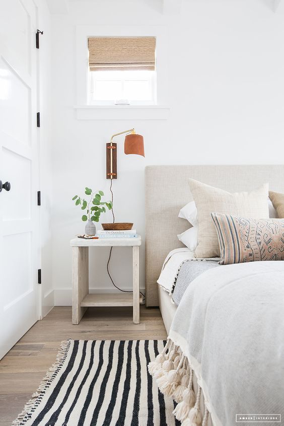 Brown Wall Sconce in Neutral Bedroom