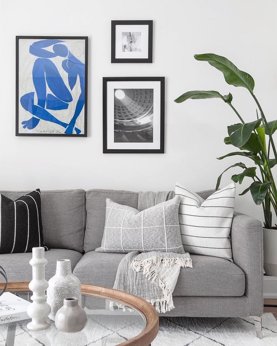 Ceramic Vases on Coffee Table and Matisse Wall Art Scandinavian Living Room via @kielyramosphoto