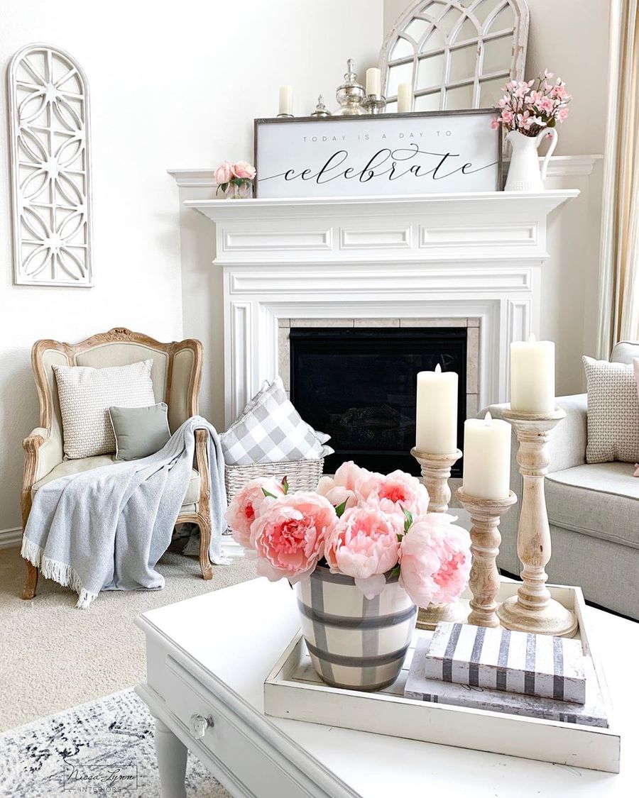 Cherry Blossoms on the Fireplace and Pink Peonies on the Coffee Table in Farmhouse Spring Living Room Decor @nissalynninteriors