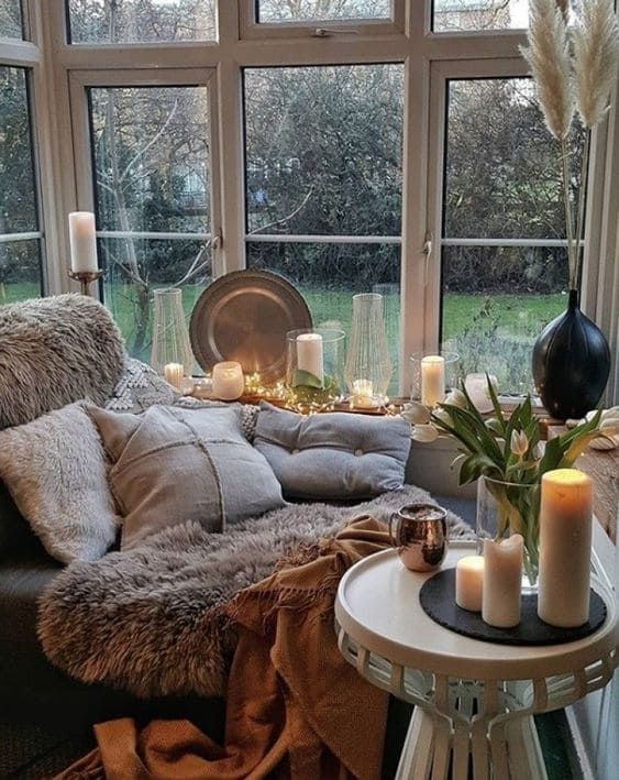Cozy Boho Reading Nook with Candles and Faux Fur Throws