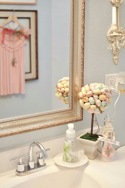 Egg topiary on bathroom vanity in Easter bathroom decor design