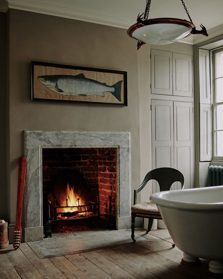 English country bathroom fireplace via Will Fisher for the Telegraph