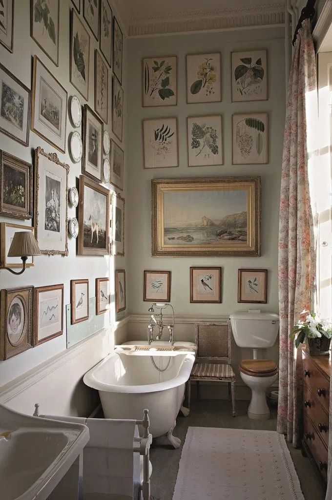 Gallery wall in English country bathroom decor ideas via Book THE ENGLISH COUNTRY HOUSE by James Peill photo by James Fennell