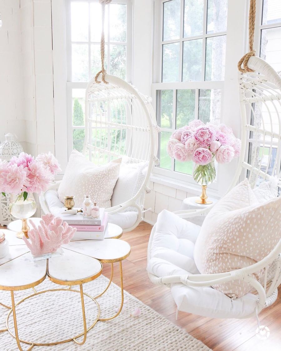 Flower Petal Table, Glam Coffee Table in Feminine Living Room with Two Hanging Rattan Chairs via @tanyarng