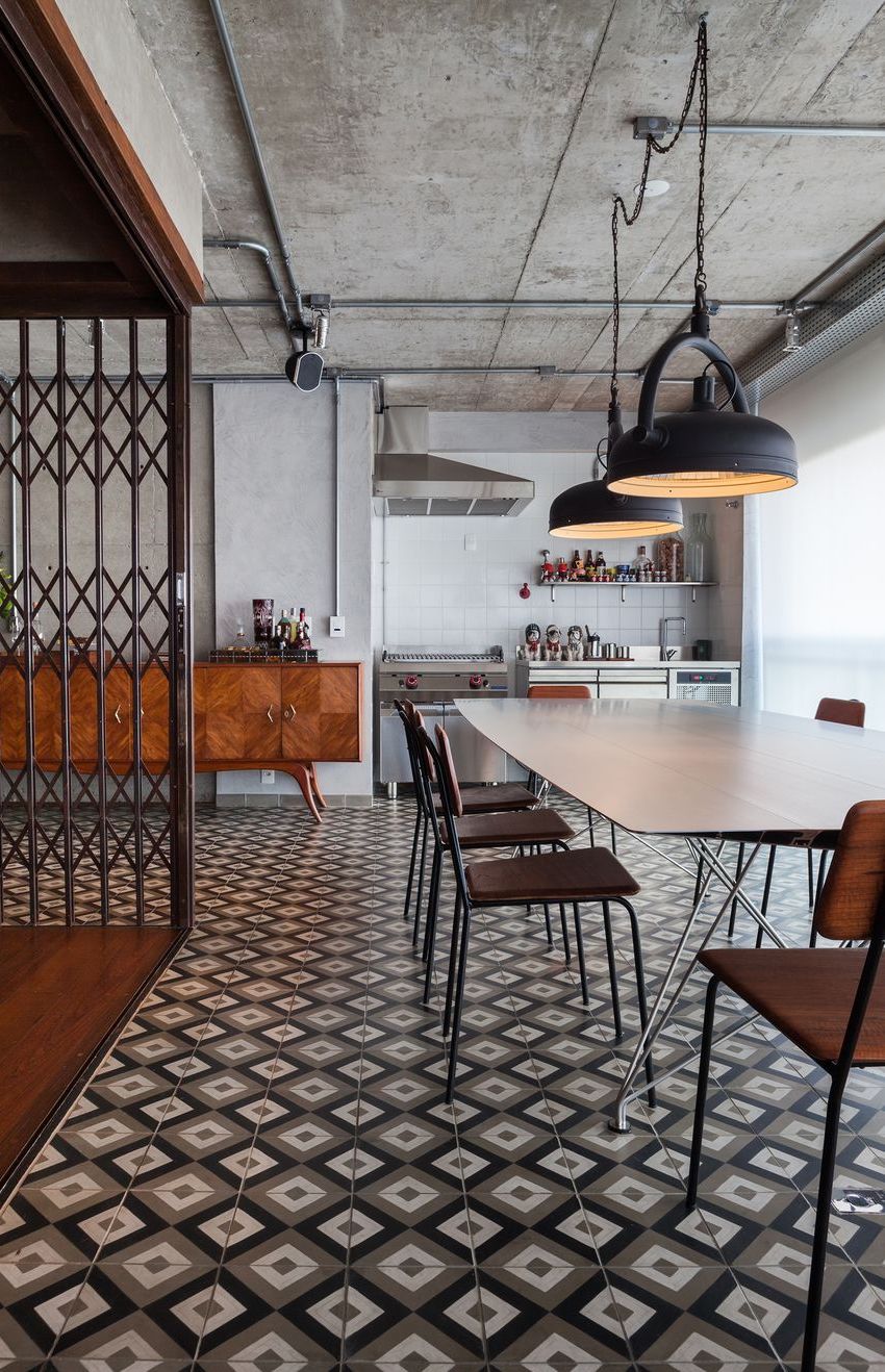 Gray Tiled Floor in Industrial Dining Room