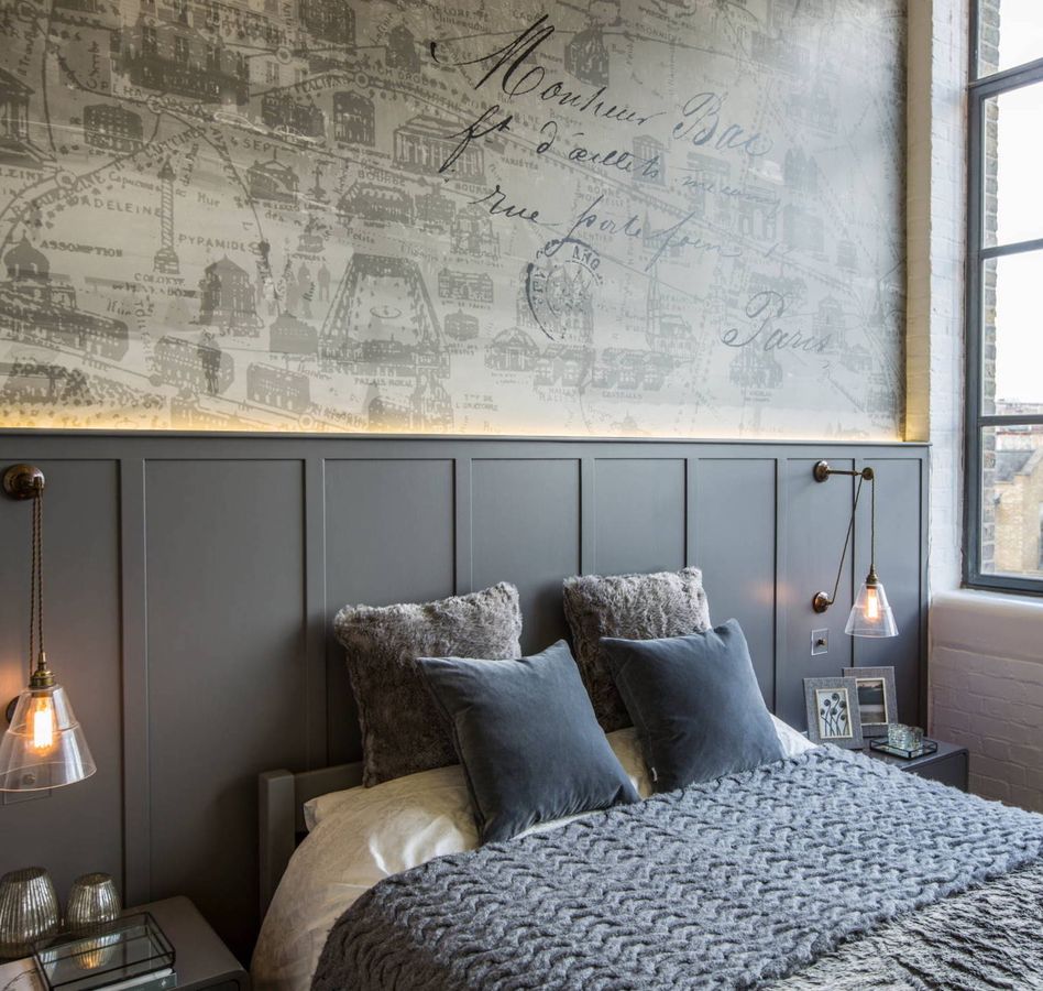 Gray paneled walls in London Industrial Bedroom decor via Milward Teverini