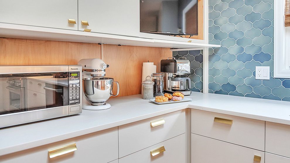 Kitchen-Aid Appliances in Mid-Century Modern kitchen via Lacy Keller Interiors