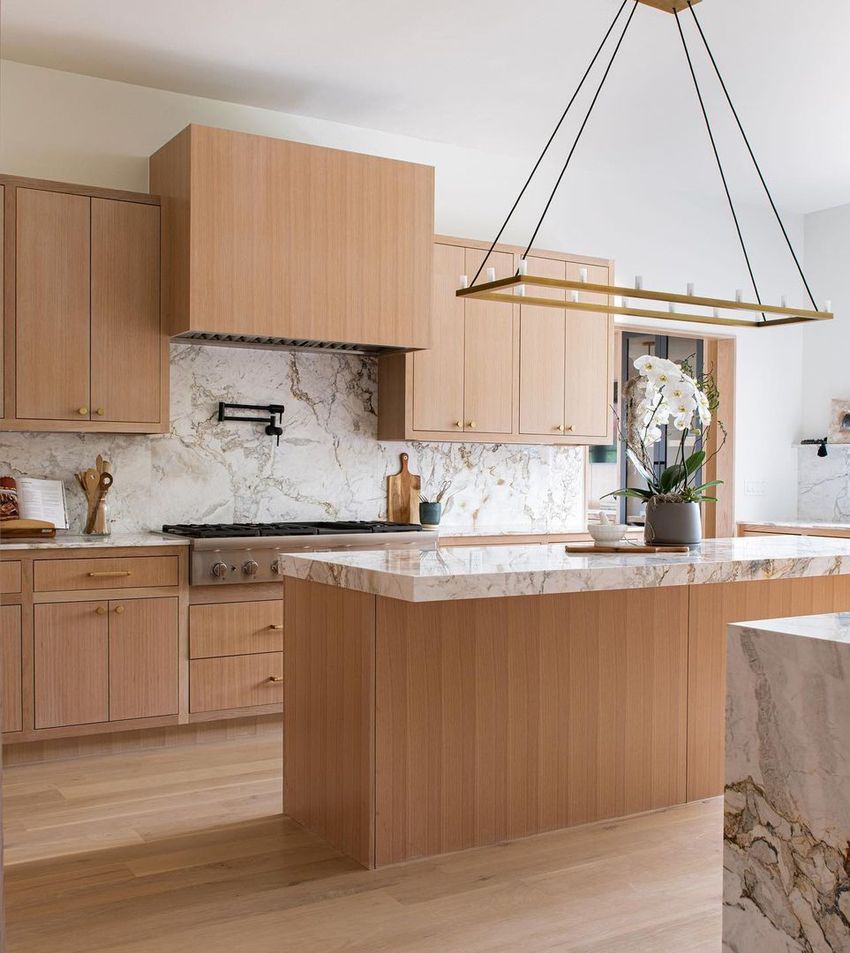 Marble Backsplash in Mid-Century Modern Kitchen Design ideas via LDI Studio Dallas