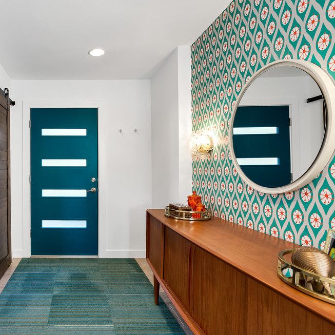 Patterned wallpaper in Mid-Century Modern Entryway via Kristen James