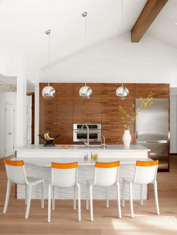 Pop of Orange Mid-Century Modern Kitchen via Champion Floor Company