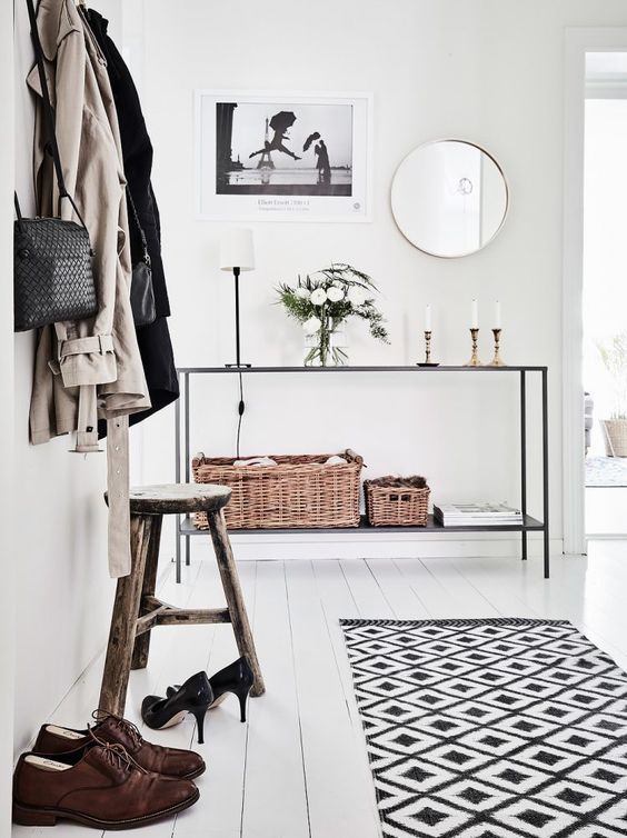 Rustic wood stool in Scandinavian entryway design ideas