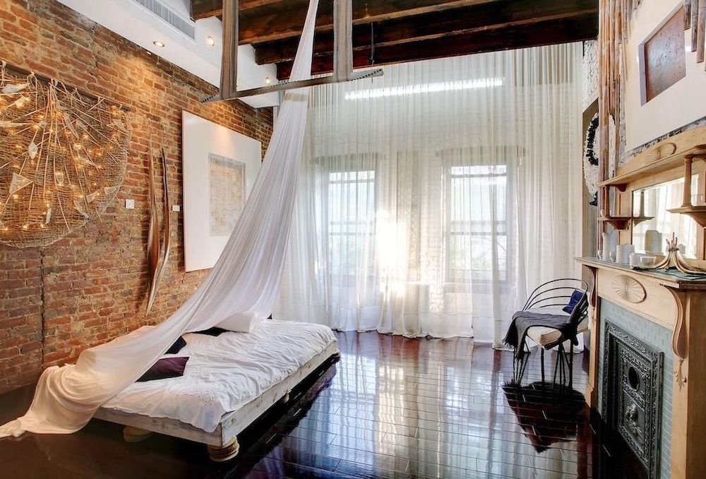 Sheer White Curtains in Industrial Bedroom Design via Laura Dante Photography