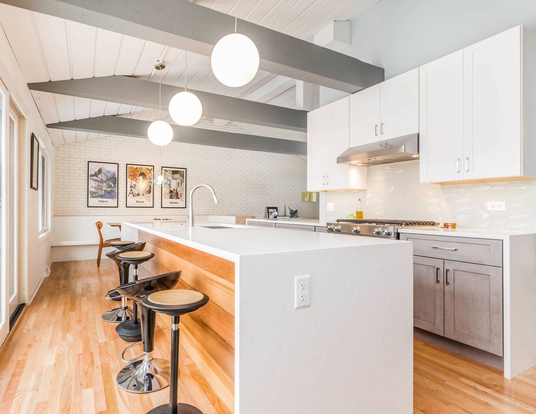 Spherical Glowing Pendant Lights Mid-Century Modern Kitchen via Liv Companies LLC Design + Build