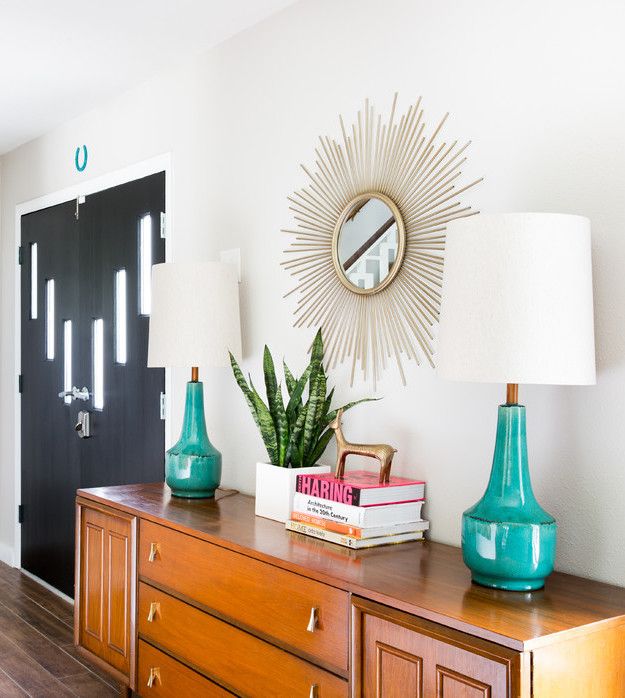 Sunburst Mirror in Mid-century modern Entryway via Becca Stephens Interiors