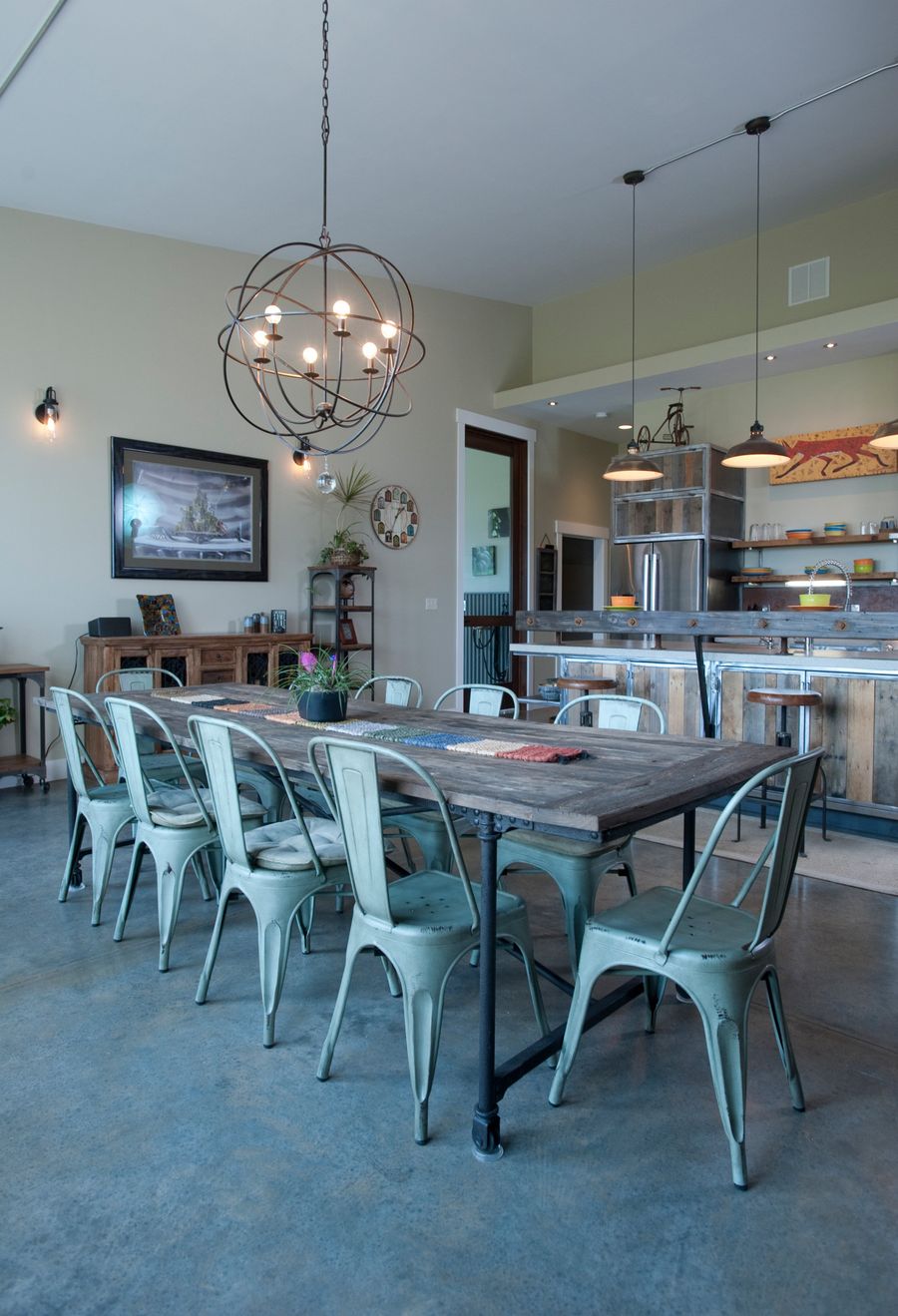 Tolix chairs industrial dining room via Penny Lane Home Builders
