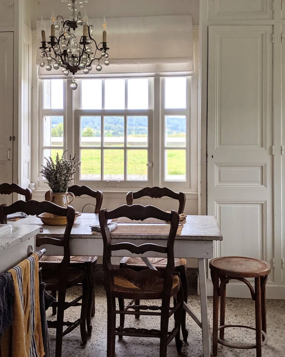 Vintage Wood Chairs in French Country Breakfast Nook via @cat_in_france