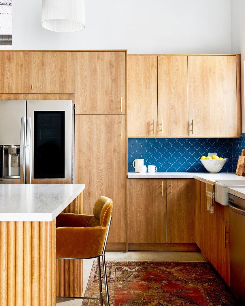 Warm Wood Cabinets and Turquoise Fish Scale Backsplash in Mid-Century Modern Kitchen via @murphydeesign