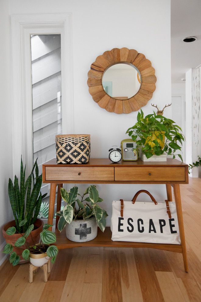 Warm Wood Console Table in Bohemian Entryway decor ideas via Margaret Wright Photography