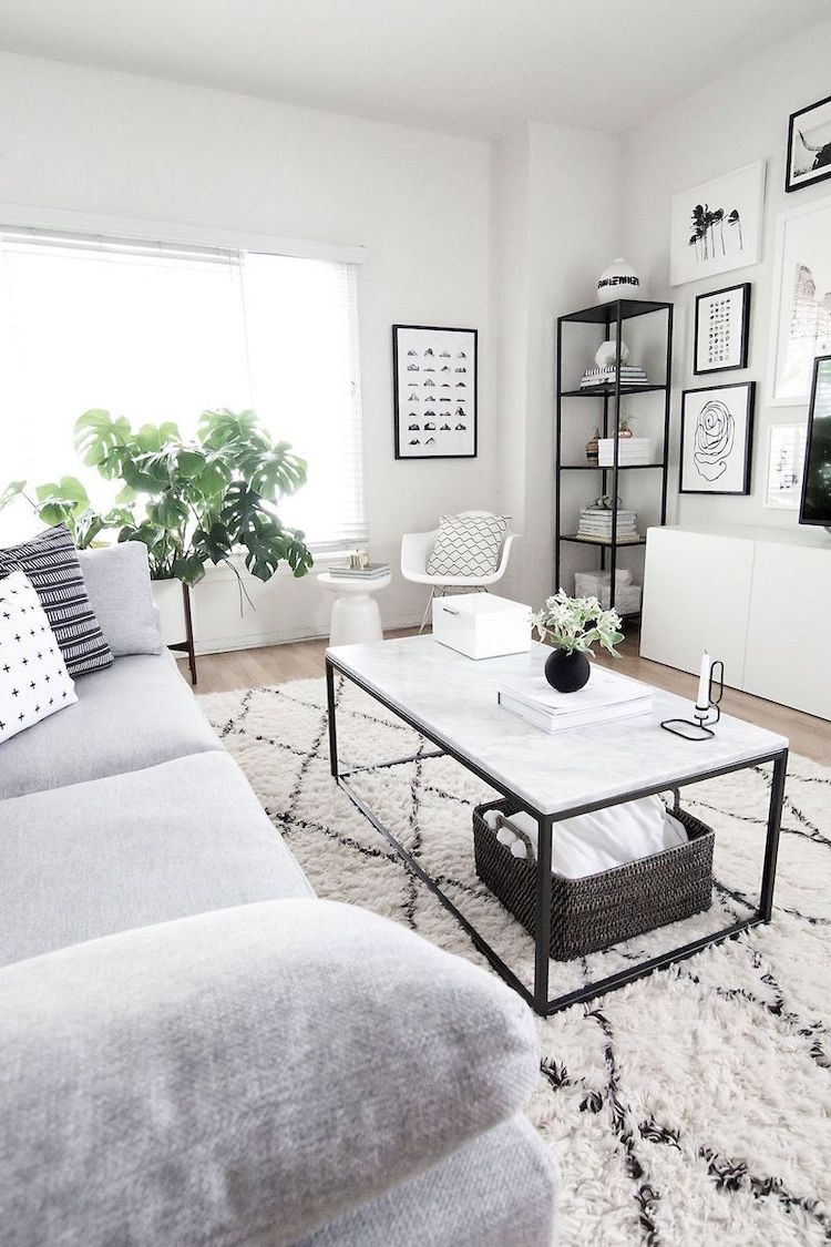 White Marble Coffee Table in Scandinavian Living Room via Homey Oh My