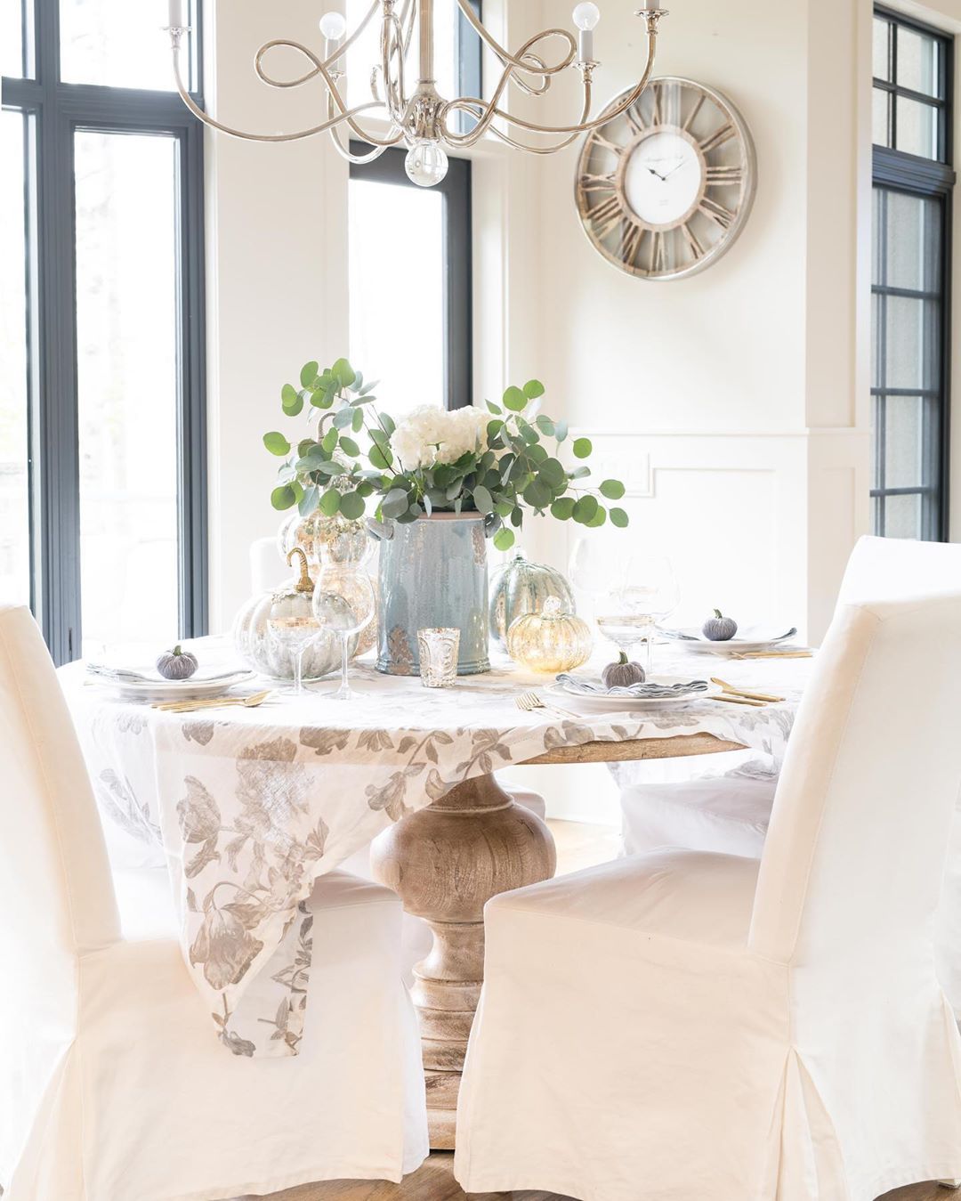 White Slipcovered Chairs in French Country Breakfast Nook via @decoratinglife.ca