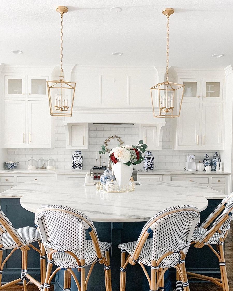 White marble countertops, half-moon kitchen island in Glam Kitchen via @shannongolddesign